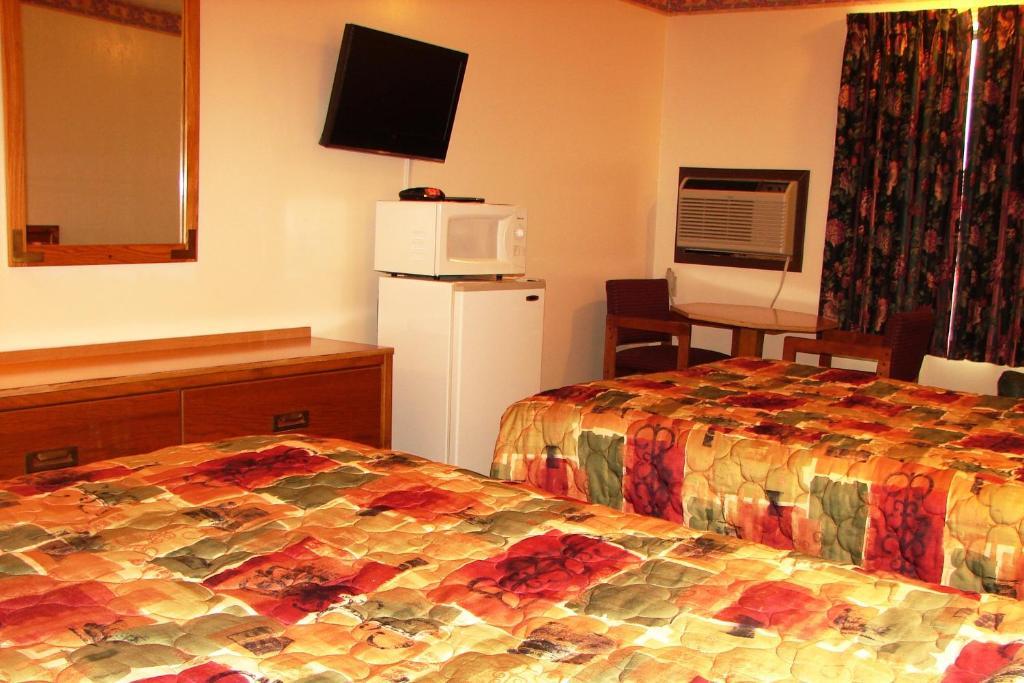 Baxter Inn 4 Less Baxter Springs Номер фото