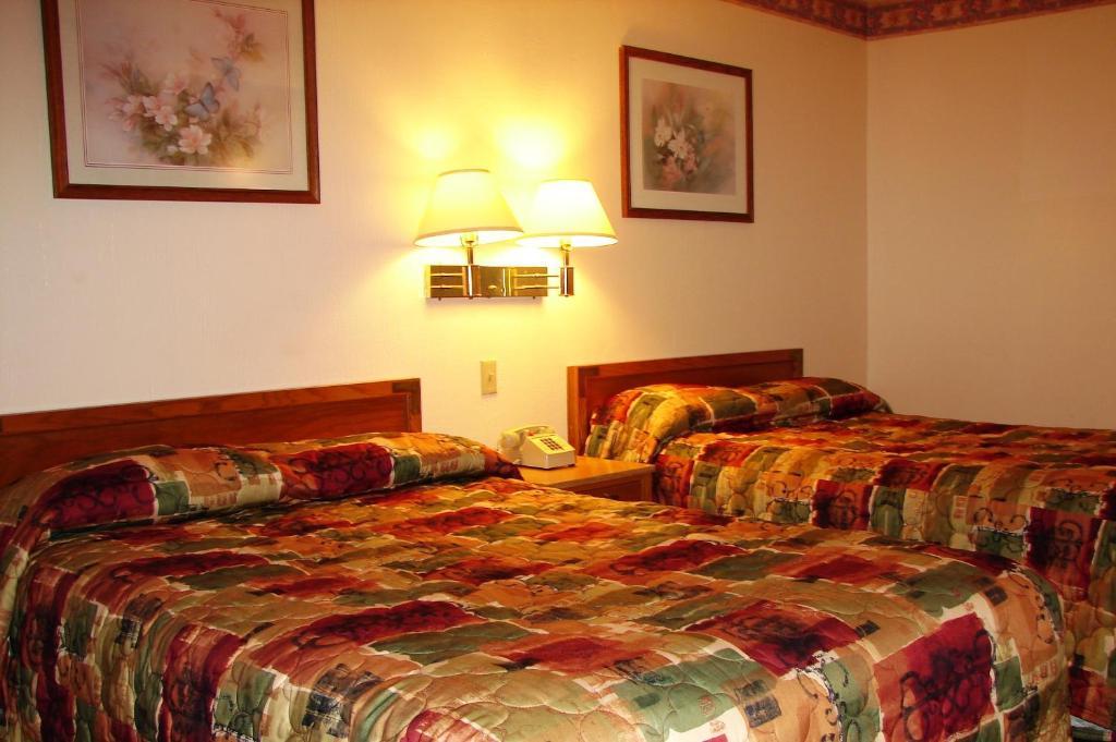 Baxter Inn 4 Less Baxter Springs Номер фото